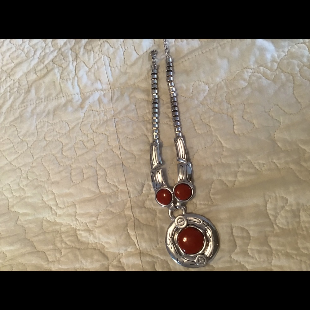 Heavy costume necklace with red stones